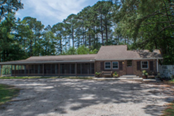 exterior one story building sit and stay awhile pet care center, doggy daycare in myrtle beach